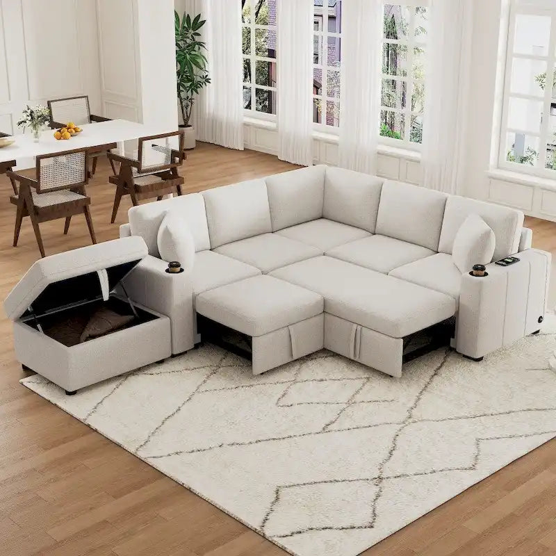Divano componibile a L beige/grigio con letto estraibile e pouf contenitore