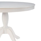 Ronde tafel met massief houten voet