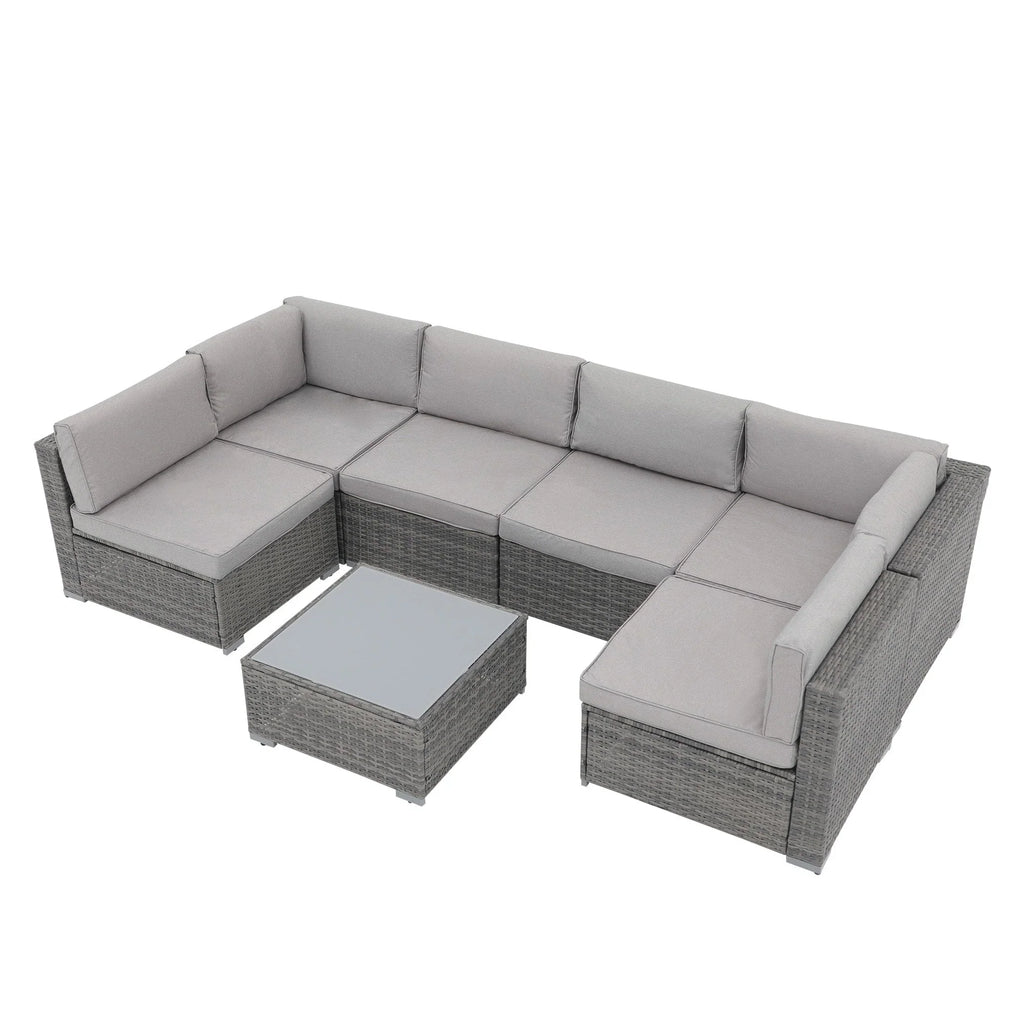 7-delige outdoor loungeset van vlechtwerk en staal met kussens