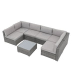 7-delige outdoor loungeset van vlechtwerk en staal met kussens