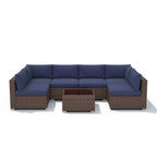 7-delige outdoor loungeset van vlechtwerk en staal met kussens