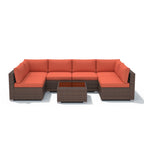 7-delige outdoor loungeset van vlechtwerk en staal met kussens