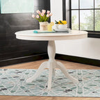 Ronde tafel met massief houten voet