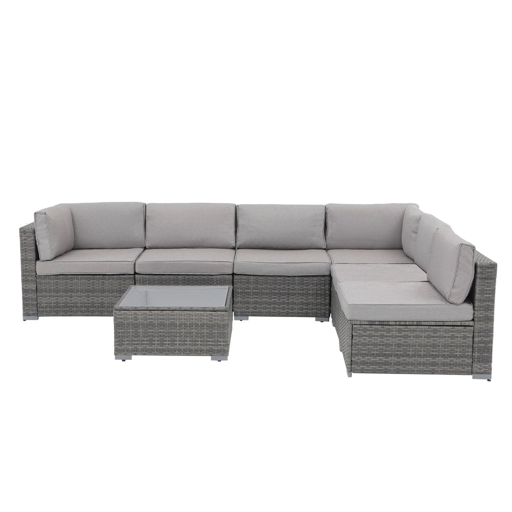 7-delige outdoor loungeset van vlechtwerk en staal met kussens