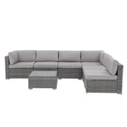 7-delige outdoor loungeset van vlechtwerk en staal met kussens