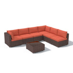 7-delige outdoor loungeset van vlechtwerk en staal met kussens