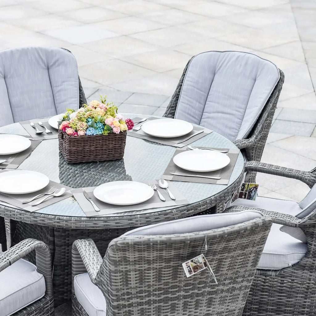 7-delige ronde eetset van rotan voor buiten op het terras, met kussens, van Moda Furnishings