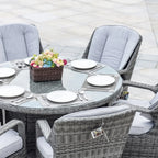 7-delige ronde eetset van rotan voor buiten op het terras, met kussens, van Moda Furnishings