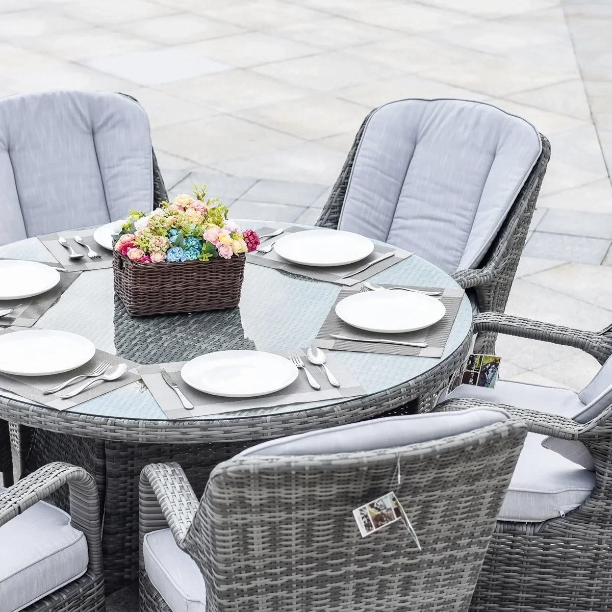 7-delige ronde eetset van rotan voor buiten op het terras, met kussens, van Moda Furnishings