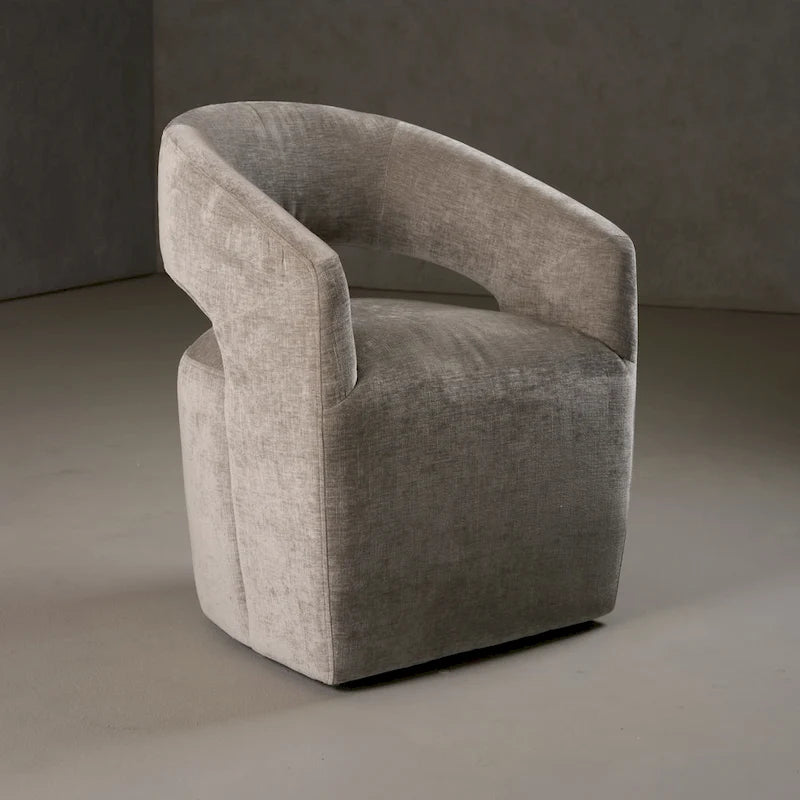 Poltroncina d'accento in tessuto grigio con schienale traforato, posto singolo