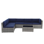 7-delige outdoor loungeset van vlechtwerk en staal met kussens