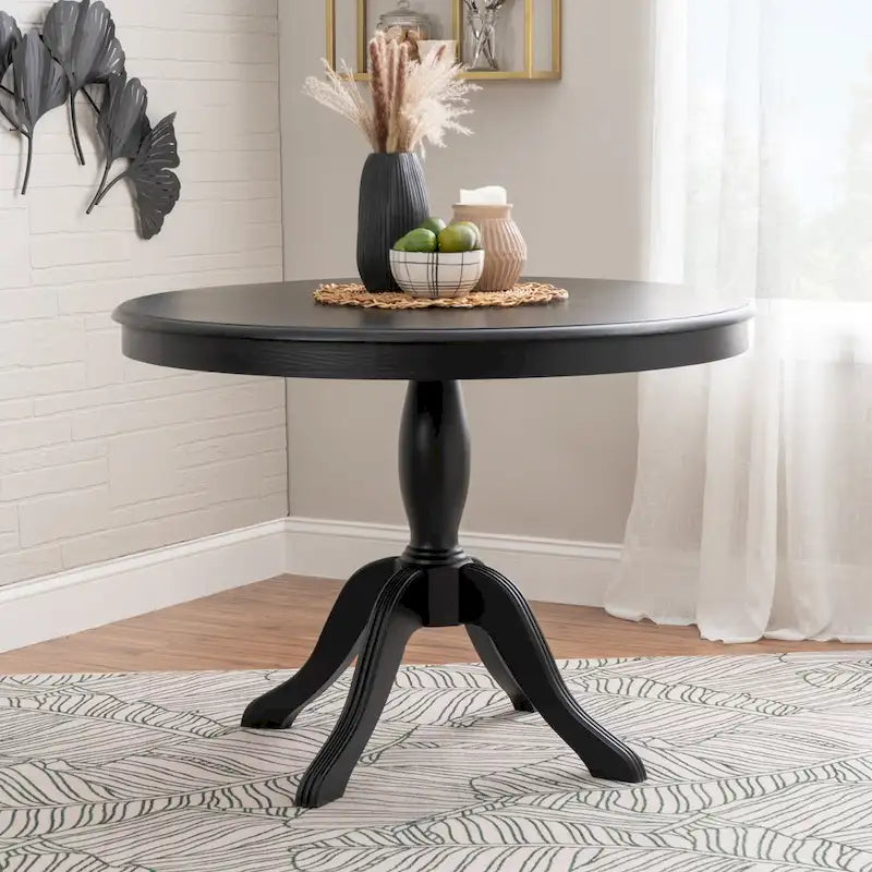 Ronde tafel met massief houten voet