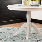 Ronde tafel met massief houten voet