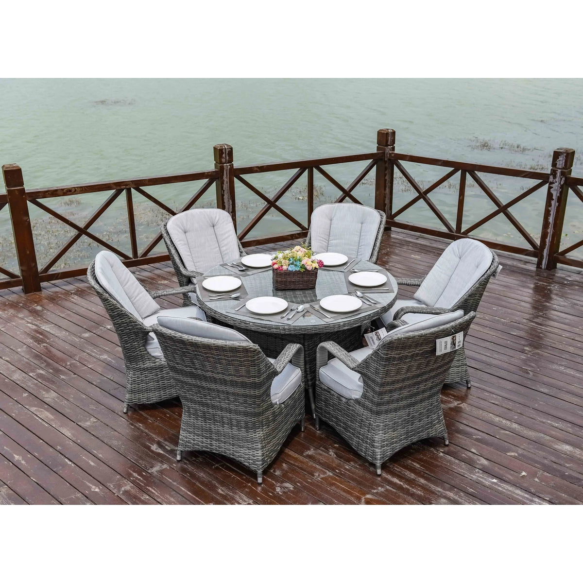 7-delige ronde eetset van rotan voor buiten op het terras, met kussens, van Moda Furnishings
