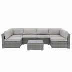 7-delige outdoor loungeset van vlechtwerk en staal met kussens