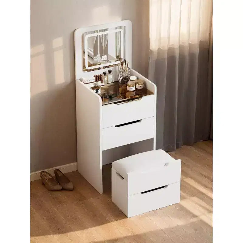Toeletta 3-in-1 Okak con specchio ribaltabile, toeletta compatta con piano in vetro trasparente e sgabello imbottito, scrivania da toeletta per camera da letto
